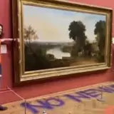 Британський суд виправдав двох кліматичних активістів. що приклеїлися до знаменитої картини